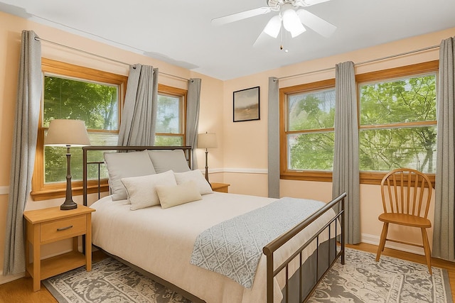 4 Sylvan Rd, White Plains, NY 10605 - bedroom with multiple windows, light wood-style flooring, and a ceiling fan