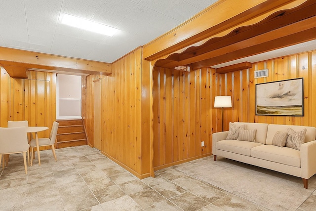 4 Sylvan Rd, White Plains, NY 10605 - living area featuring wooden walls and stone finish flooring