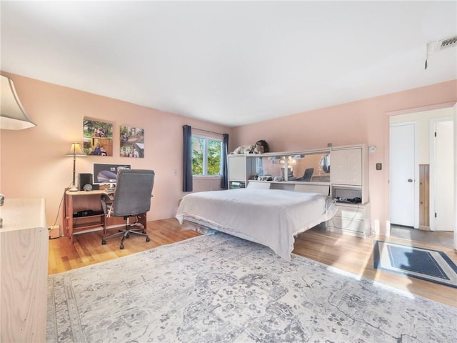 1 Thornbrook Ln N, Suffern, NY 10901 - bedroom with wood finished floors and a desk