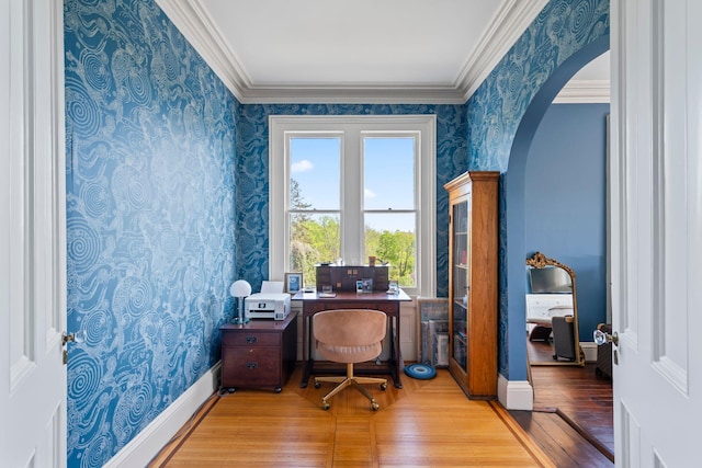 381 W Neck Rd, Lloyd Harbor, NY 11743 - home office featuring arched walkways, wood finished floors, ornamental molding, and wallpapered walls