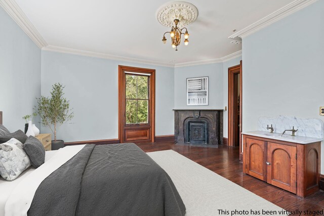 381 W Neck Rd, Lloyd Harbor, NY 11743 - bedroom featuring crown molding, baseboards, dark wood finished floors, and a notable chandelier