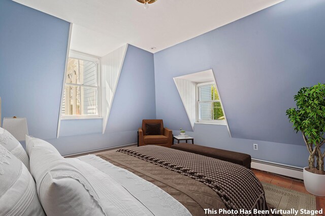 381 W Neck Rd, Lloyd Harbor, NY 11743 - bedroom featuring a baseboard heating unit