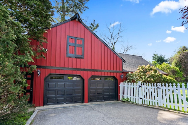 381 W Neck Rd, Lloyd Harbor, NY 11743 - garage with driveway and fence