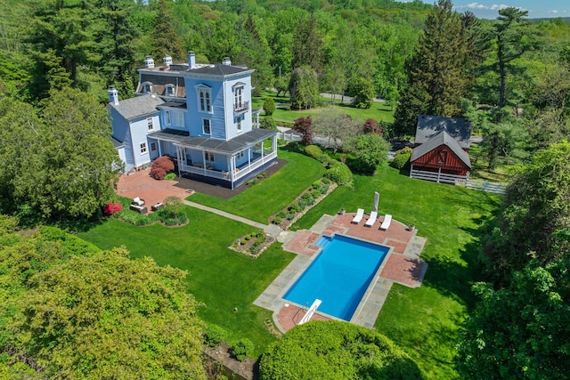 381 W Neck Rd, Lloyd Harbor, NY 11743 - drone / aerial view of a forest and a pool area
