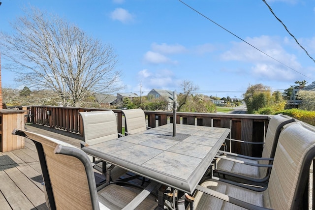 18 Hoppin Ave, Montauk, NY 11954 - wooden deck with outdoor dining space