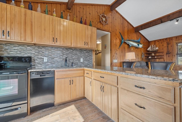 18 Hoppin Ave, Montauk, NY 11954 - kitchen with backsplash, electric range, a sink, wooden walls, and dishwashing machine