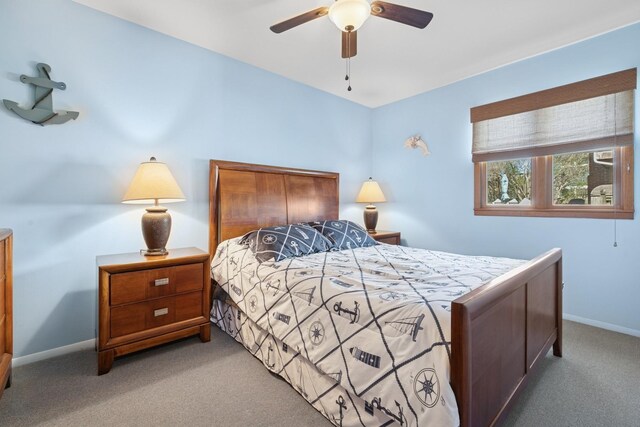 18 Hoppin Ave, Montauk, NY 11954 - bedroom with light colored carpet, baseboards, and ceiling fan