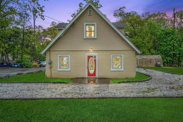 2 Random Rd, Greenwood Lake, NY 10925 - view of front of home with stucco siding and a front yard