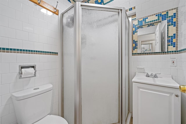2 Random Rd, Greenwood Lake, NY 10925 - full bath featuring tile walls, a stall shower, toilet, and vanity