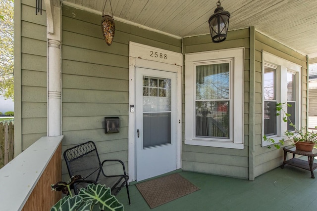 doorway to property with covered porch
