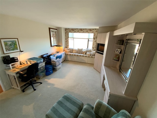 office space with light colored carpet
