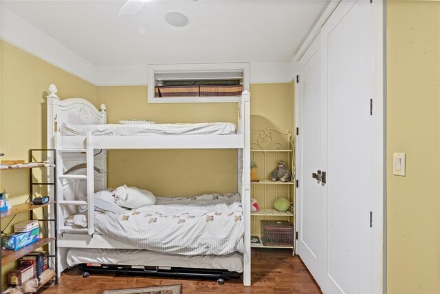 bedroom with a closet and wood finished floors
