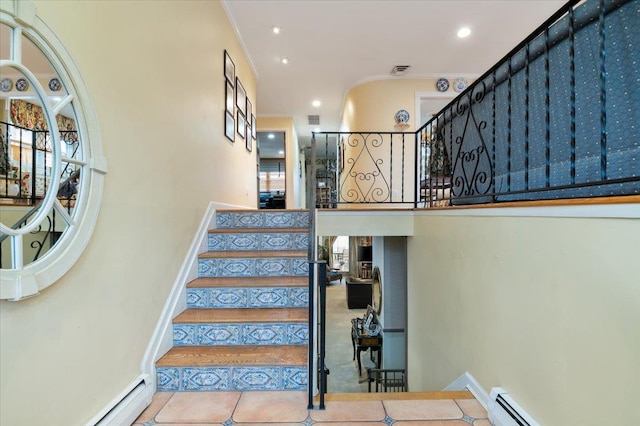stairs featuring ornamental molding, baseboards, baseboard heating, recessed lighting, and tile patterned floors