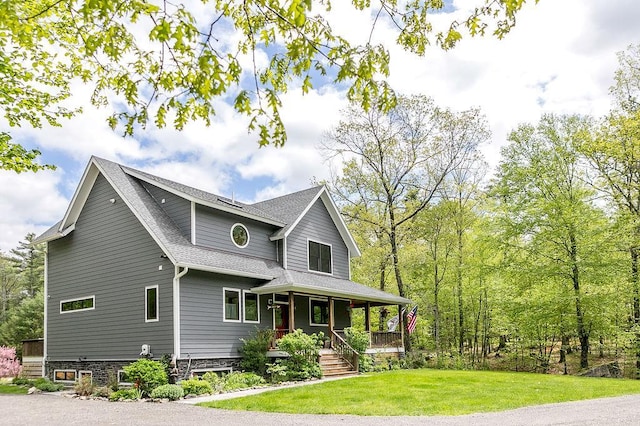 43 Bee Tree Ln, Accord, NY 12404 - view of front facade with a porch, a shingled roof, and a front lawn