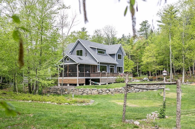 43 Bee Tree Ln, Accord, NY 12404 - back of property with a sunroom, a lawn, and a deck