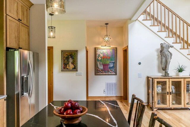 43 Bee Tree Ln, Accord, NY 12404 - dining room featuring light wood-style floors and stairs
