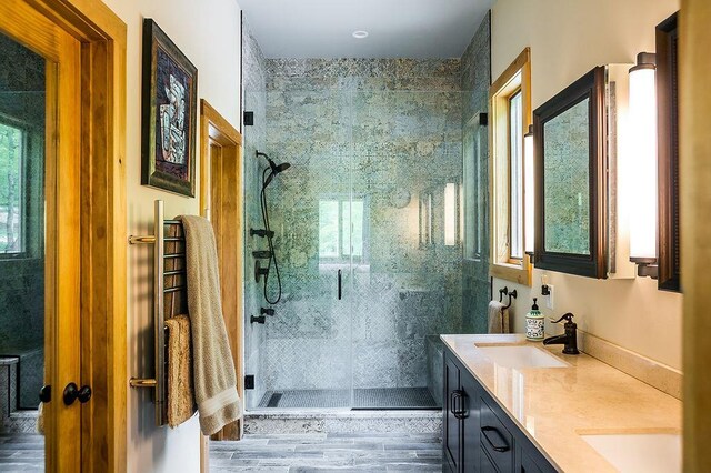 43 Bee Tree Ln, Accord, NY 12404 - full bath featuring plenty of natural light, a shower stall, double vanity, and wood finished floors