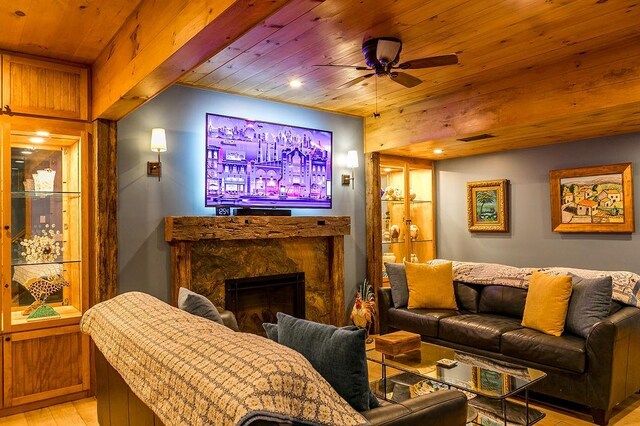 43 Bee Tree Ln, Accord, NY 12404 - living area featuring wood ceiling, light wood-type flooring, ceiling fan, a fireplace, and recessed lighting