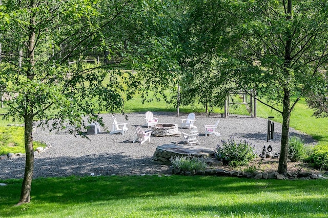 43 Bee Tree Ln, Accord, NY 12404 - view of green lawn with an outdoor fire pit