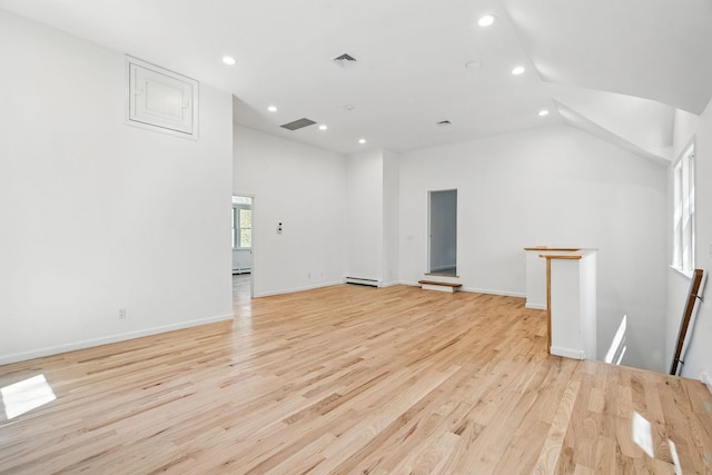 bonus room featuring a baseboard radiator, recessed lighting, vaulted ceiling, light wood-type flooring, and visible vents