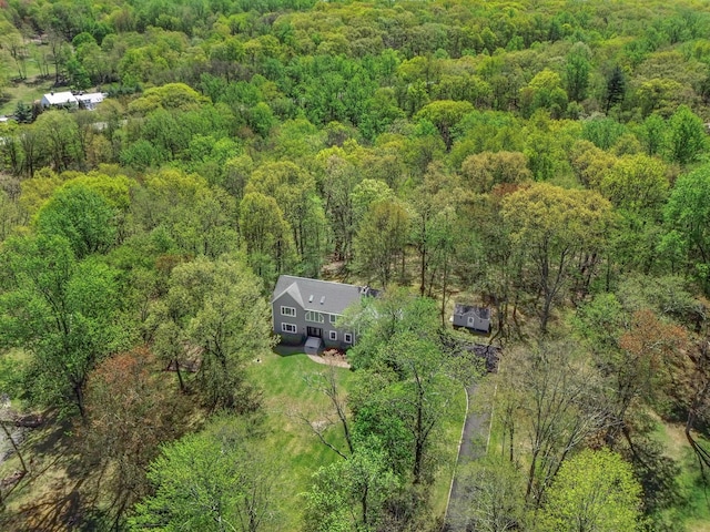 aerial view with a wooded view