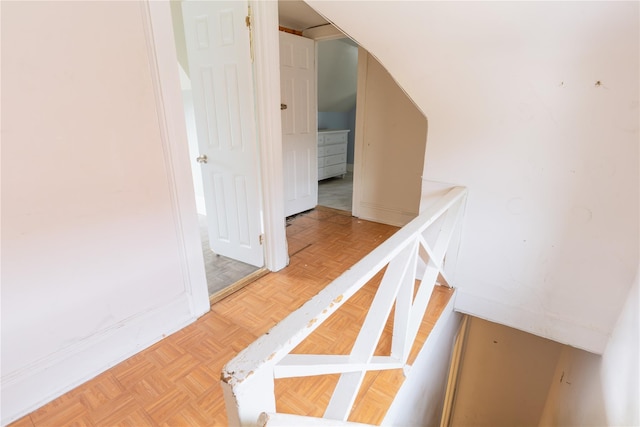 hallway featuring baseboards