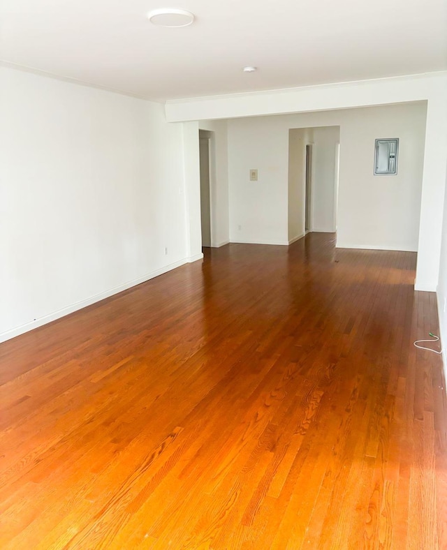 empty room featuring wood finished floors