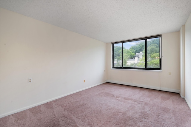 25 Rockledge Ave Unit 601, White Plains, NY 10601 - carpeted empty room with a textured ceiling and baseboards