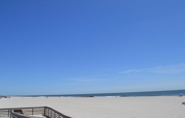 property view of water featuring a view of the beach