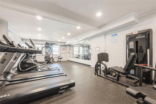 workout area with recessed lighting
