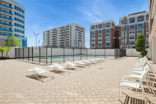 community pool featuring fence