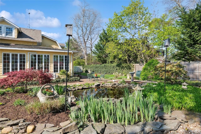 view of yard with fence and a patio area