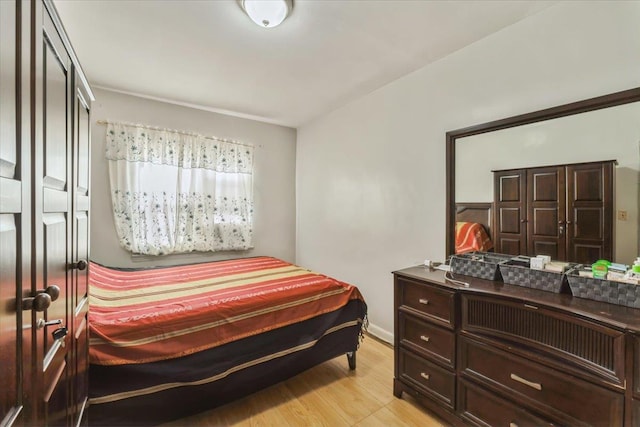 bedroom with light wood-style flooring