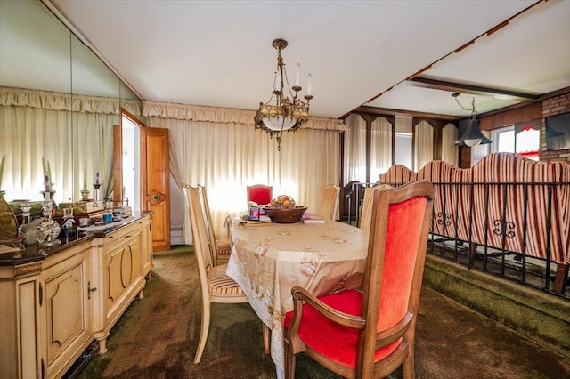 dining space with dark carpet, a notable chandelier, and baseboard heating
