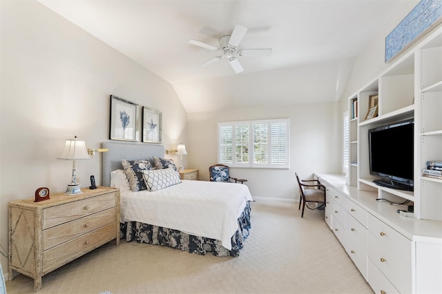 bedroom with baseboards, ceiling fan, light carpet, and vaulted ceiling