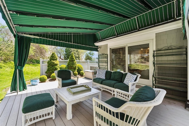 wooden deck featuring fence and an outdoor hangout area