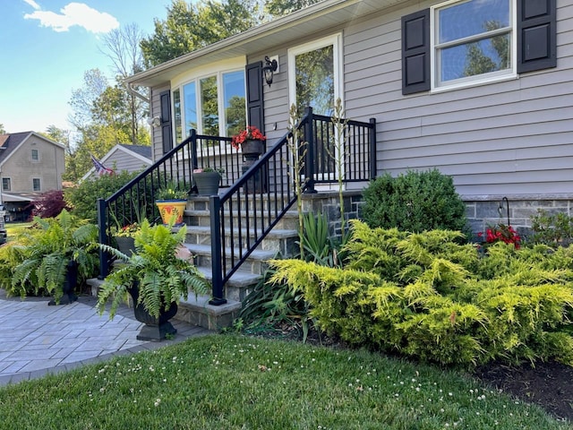 property entrance featuring a patio