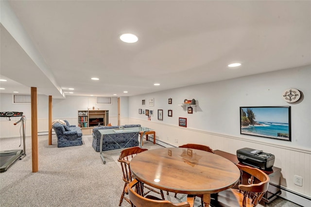 dining area featuring a baseboard radiator, carpet flooring, and recessed lighting