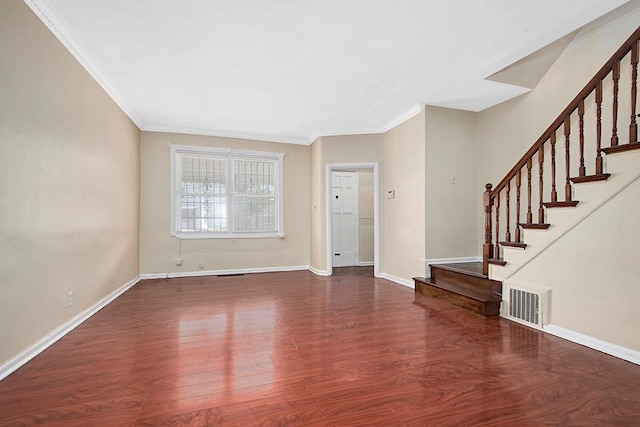 unfurnished living room featuring visible vents, stairs, and wood finished floors