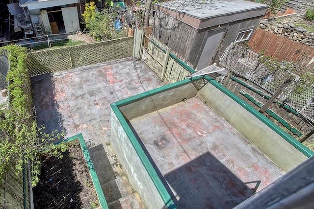entry to storm shelter with fence