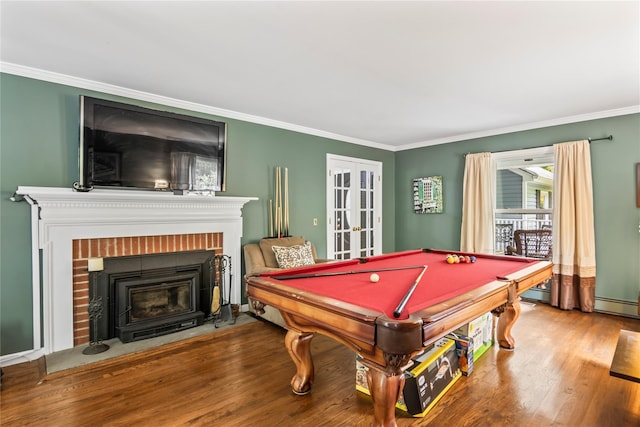 7 E Gate Ln, Setauket, NY 11733 - game room featuring ornamental molding, a brick fireplace, wood finished floors, billiards table, and french doors