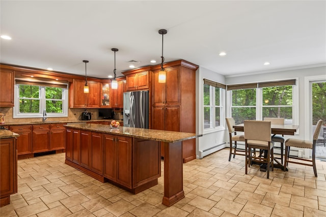 7 E Gate Ln, Setauket, NY 11733 - kitchen featuring stainless steel fridge, a sink, stone finish floors, a kitchen island, and backsplash