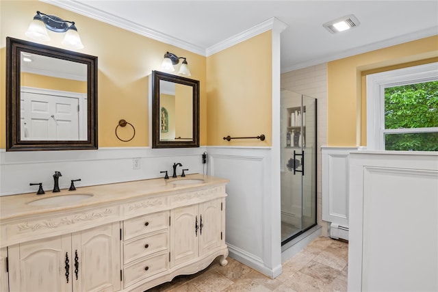 7 E Gate Ln, Setauket, NY 11733 - bathroom featuring baseboard heating, ornamental molding, a stall shower, double vanity, and a wainscoted wall