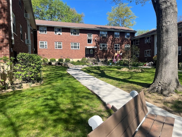 surrounding community with a lawn
