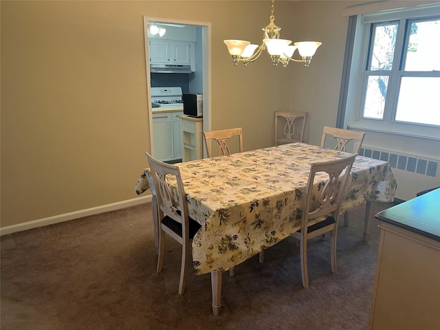 dining space with carpet flooring, baseboards, a notable chandelier, and radiator heating unit