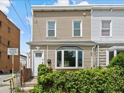 66-39 Jay Ave, Maspeth, NY 11378 - view of front facade with fence