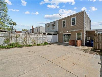 66-39 Jay Ave, Maspeth, NY 11378 - back of house with fence