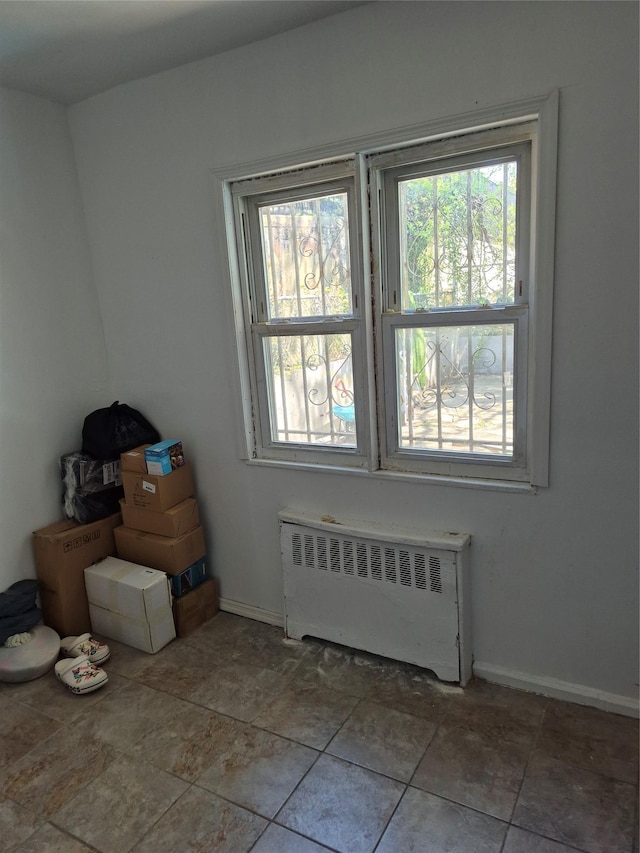 3238 Tenbroeck Ave, Bronx, NY 10469 - unfurnished room with radiator heating unit and baseboards