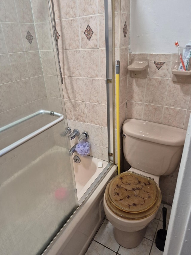 3238 Tenbroeck Ave, Bronx, NY 10469 - full bathroom with toilet, tile walls, shower / bathing tub combination, and tile patterned flooring