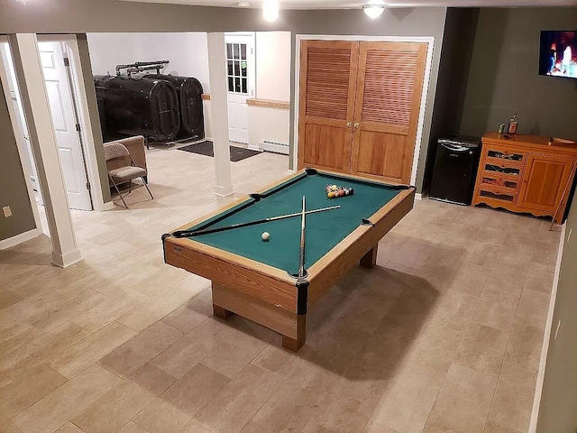 playroom with a baseboard heating unit and pool table
